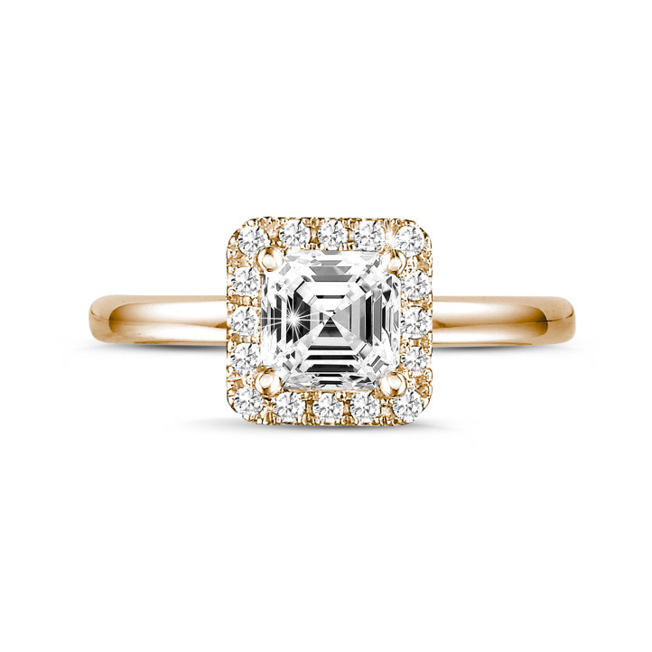 1.00 carat solitaire halo ring with an asscher cut diamond in red gold and round diamonds