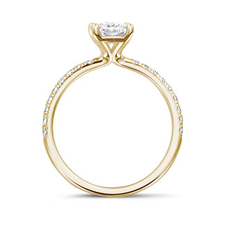 Rings - 1.00 carat solitaire ring with a radiant cut diamond in yellow gold with side diamonds