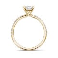 2.00 carat solitaire ring with a radiant cut diamond in yellow gold with side diamonds