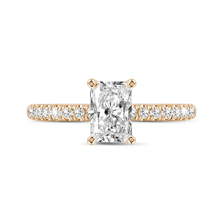 1.50 carat solitaire ring with a radiant cut diamond in red gold with side diamonds