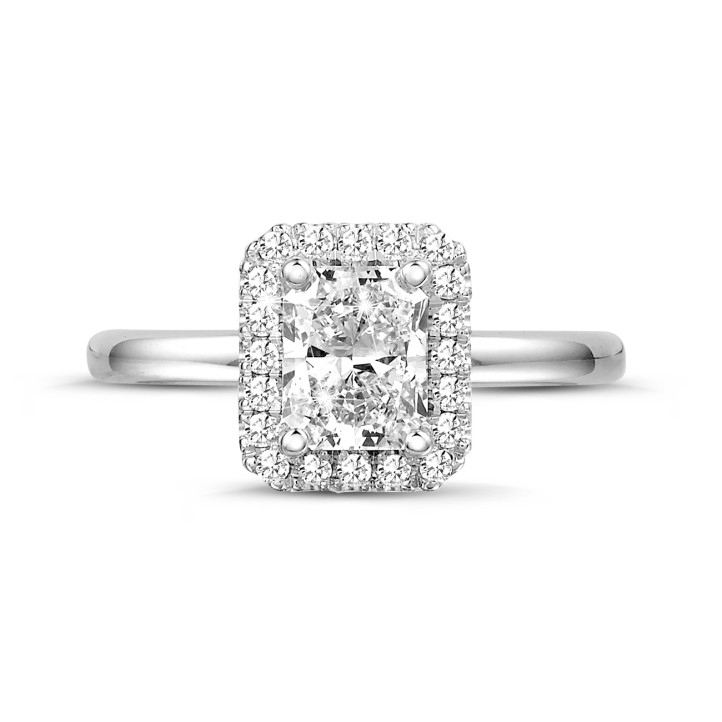 1.20 carat solitaire halo ring with a radiant cut diamond in white gold with round diamonds