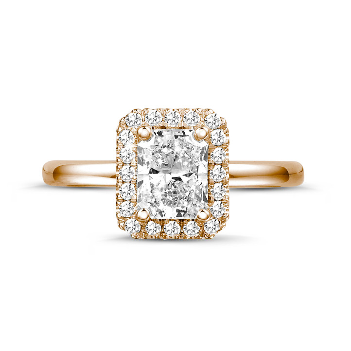 1.00 carat solitaire halo ring with a radiant cut diamond in red gold with round diamonds