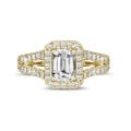 1.00 carat solitaire ring in yellow gold with an emerald cut diamond and side diamonds