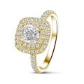 1.20 carat solitaire double halo ring with a cushion diamond in yellow gold