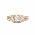 0.50 carat solitaire ring in red gold with princess diamond and side diamonds