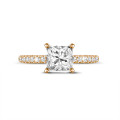 1.00 carat solitaire ring with a princess diamond and hidden halo in red gold