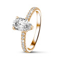 2.00 Ct. solitaire ring in red gold with pear diamond and hidden halo