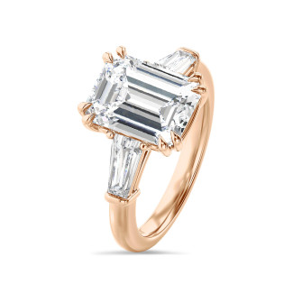 Bespoke solitaire ring with an emerald cut diamond