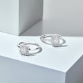 1.20 carat solitaire halo ring with an asscher cut diamond in white gold and round diamonds
