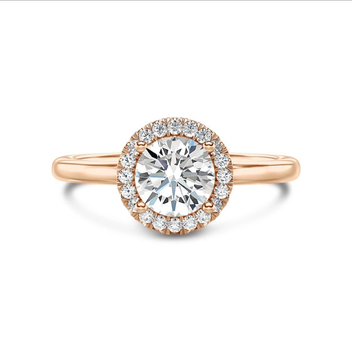 1.20 carat solitaire halo ring in red gold with round diamonds