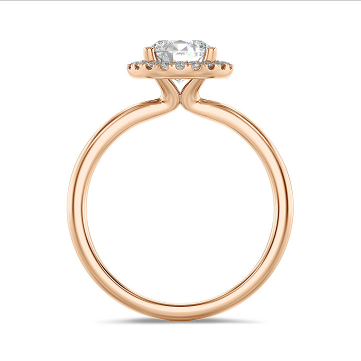 1.50 carat solitaire halo ring in red gold with round diamonds