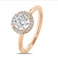 2.00 carat solitaire halo ring in red gold with round diamonds