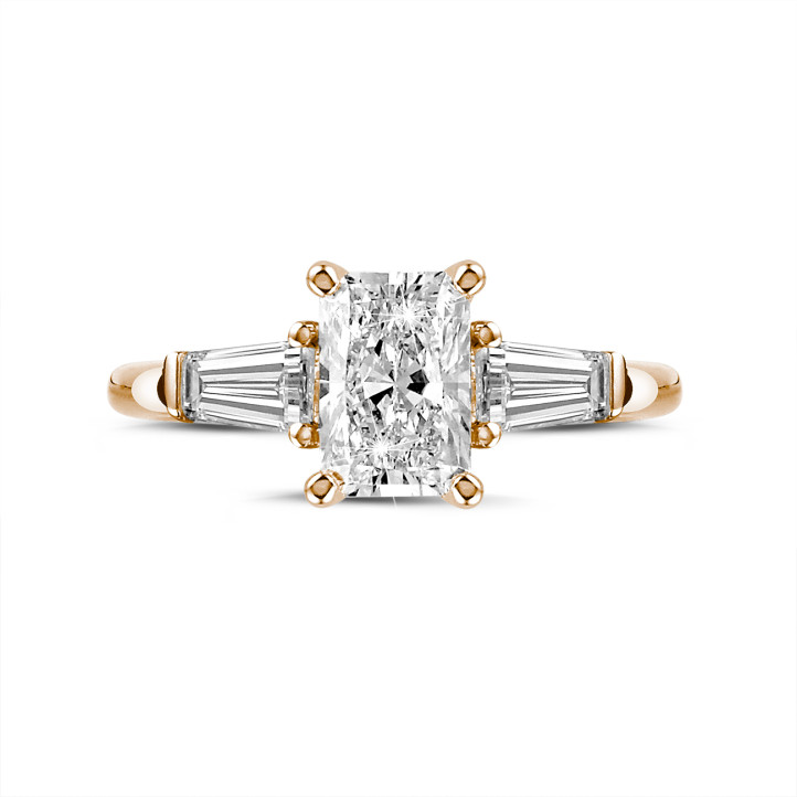 2.00 carat trilogy ring in red gold with a radiant cut diamond and tapered baguettes