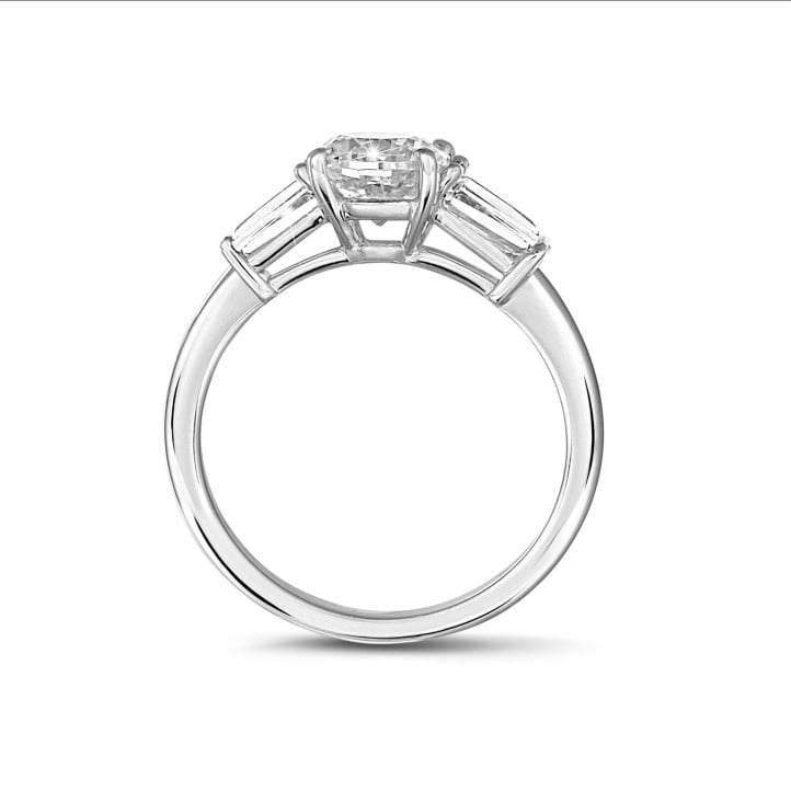 1.50 carat trilogy ring in white gold with a cushion diamond and tapered baguettes