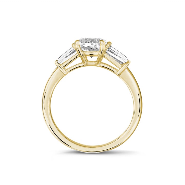 1.50 carat trilogy ring in yellow gold with pear diamond and tapered baguettes