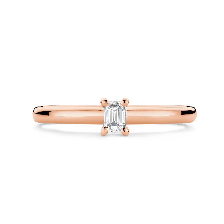 0.15 carat solitaire ring with a emerald cut diamond in red gold