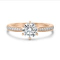 0.50 carat solitaire diamond ring in red gold with side diamonds
