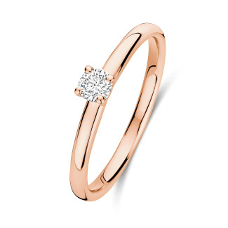 0.15 carat solitaire ring with a round cut diamond in red gold