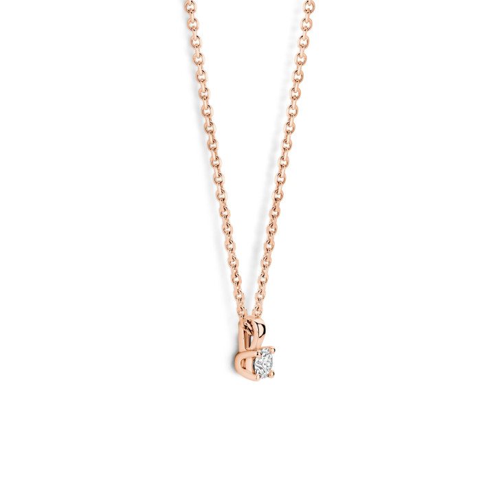 0.15 carat solitaire pendant with a round cut diamond in red gold