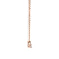 0.15 carat solitaire pendant with a round cut diamond in red gold