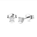0.30 carat solitaire earrings with princess cut diamonds in white gold