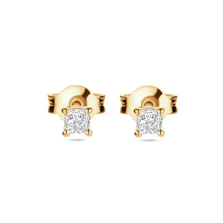 0.30 carat solitaire earrings with cushion cut diamonds in yellow gold