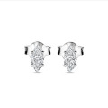 0.30 carat solitaire earrings with Marquise cut diamonds in white gold