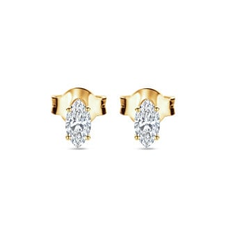 0.30 carat solitaire earrings with Marquise cut diamonds in yellow gold