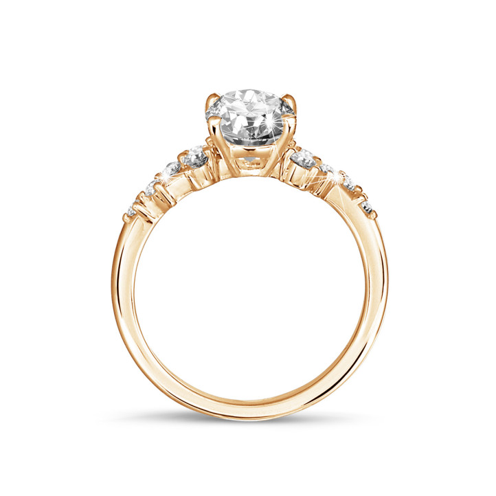 1.50 carat solitaire cluster ring in red gold with oval diamond