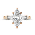 1.00 carat trilogy ring in red gold with marquise diamond and tapered baguettes