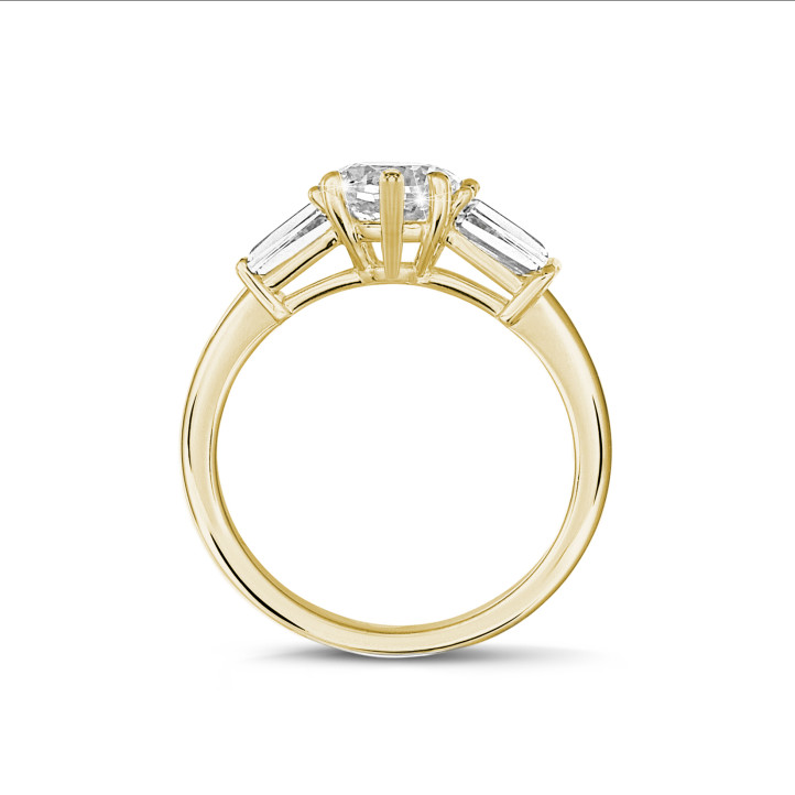 1.50 carat trilogy ring in yellow gold with marquise diamond and tapered baguettes