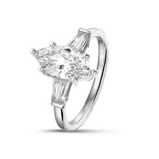 Engagement - 1.50 carat trilogy ring in platinum with marquise diamond and tapered baguettes