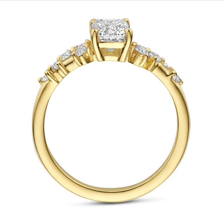 1.20 carat solitaire cluster ring in yellow gold with an emerald cut diamond
