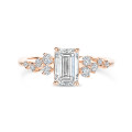 1.20 carat solitaire cluster ring in red gold with an emerald cut diamond
