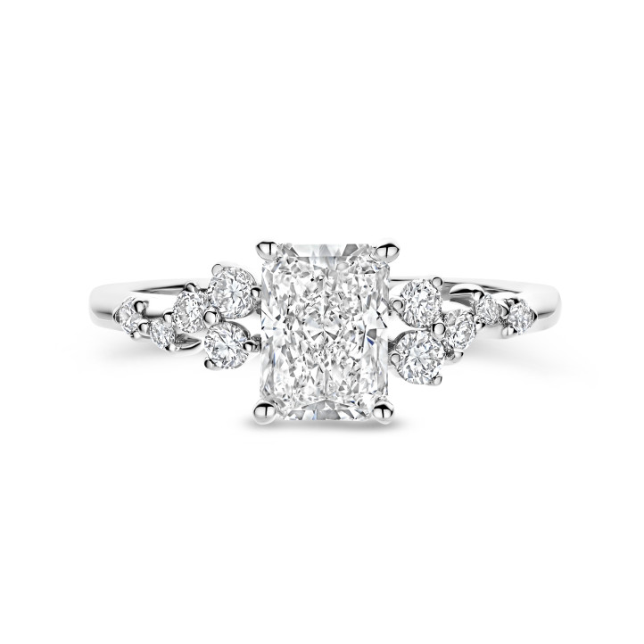 1.50 carat solitaire cluster ring in white gold with a radiant cut diamond