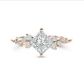 1.20 carat solitaire cluster ring in red gold with a princess cut diamond