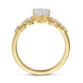 1.00 carat solitaire cluster ring in yellow gold with a pear cut diamond