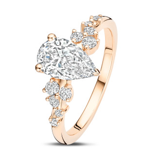 Rings - 1.00 carat solitaire cluster ring in red gold with a pear cut diamond