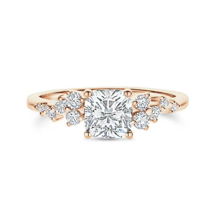 1.20 carat solitaire cluster ring in red gold with a cushion cut diamond