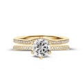 2.50 carat solitaire ring in yellow gold with side diamonds