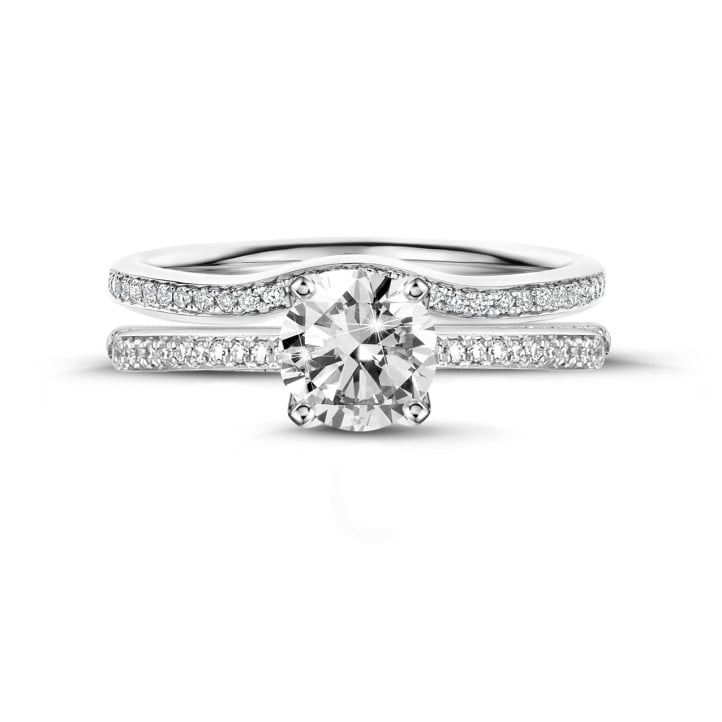 0.50 carat solitaire ring in white gold with side diamonds