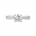 0.70 carat solitaire diamond ring in white gold with side diamonds