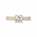 0.50 carat solitaire diamond ring in yellow gold with side diamonds