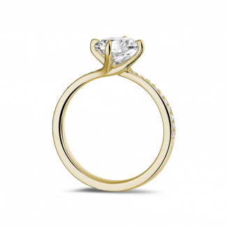 Engagement - 1.50 carat solitaire diamond ring in yellow gold with side diamonds