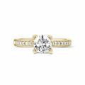 0.90 carat solitaire diamond ring in yellow gold with side diamonds
