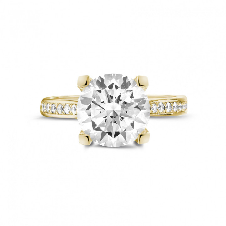 3.00 carat solitaire diamond ring in yellow gold with side diamonds