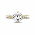 2.00 carat solitaire diamond ring in yellow gold with side diamonds