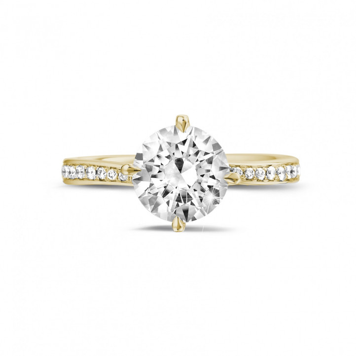 2.00 carat solitaire diamond ring in yellow gold with side diamonds