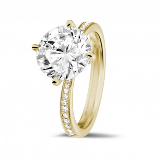 Rings - 3.00 carat solitaire diamond ring in yellow gold with side diamonds