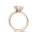 2.00 carat solitaire diamond ring in red gold with side diamonds